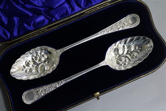 A cased pair of late Victorian silver berry spoons by William Hutton & Sons, London, 1899, 5.3 oz.